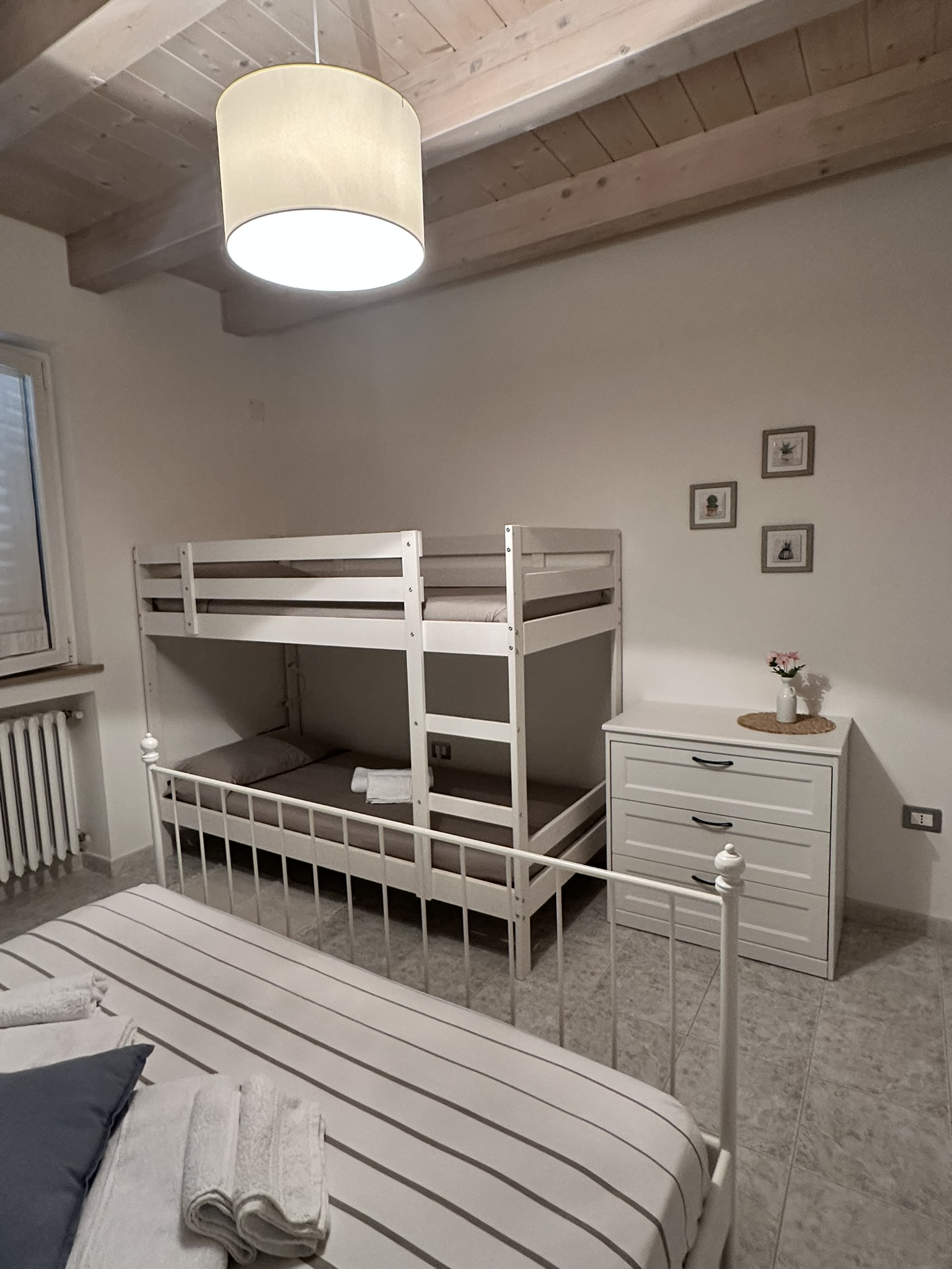 Camera con quattro posti letto